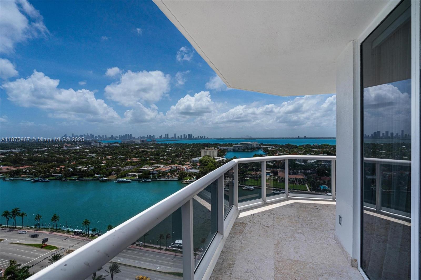 4779 Collins Avenue, Unit 2305 Miami Beach, FL 33140 - Photo 21 of 35 a view of balcony with city and mountain view
