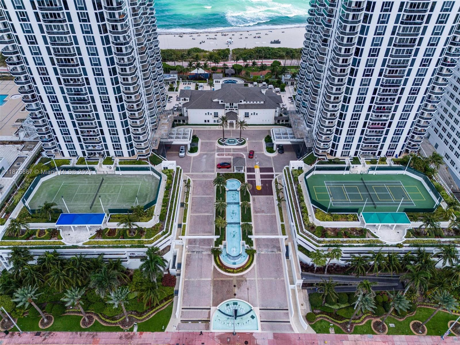 4779 Collins Avenue, Unit 2305 Miami Beach, FL 33140 - Photo 23 of 35 an aerial view of a houses with yard