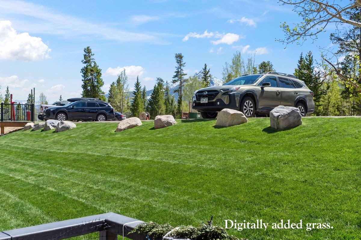 89410 Ryan Gulch Road, Unit 208 Silverthorne, CO 80498 - Photo 27 of 30 a view of a garden with sitting area