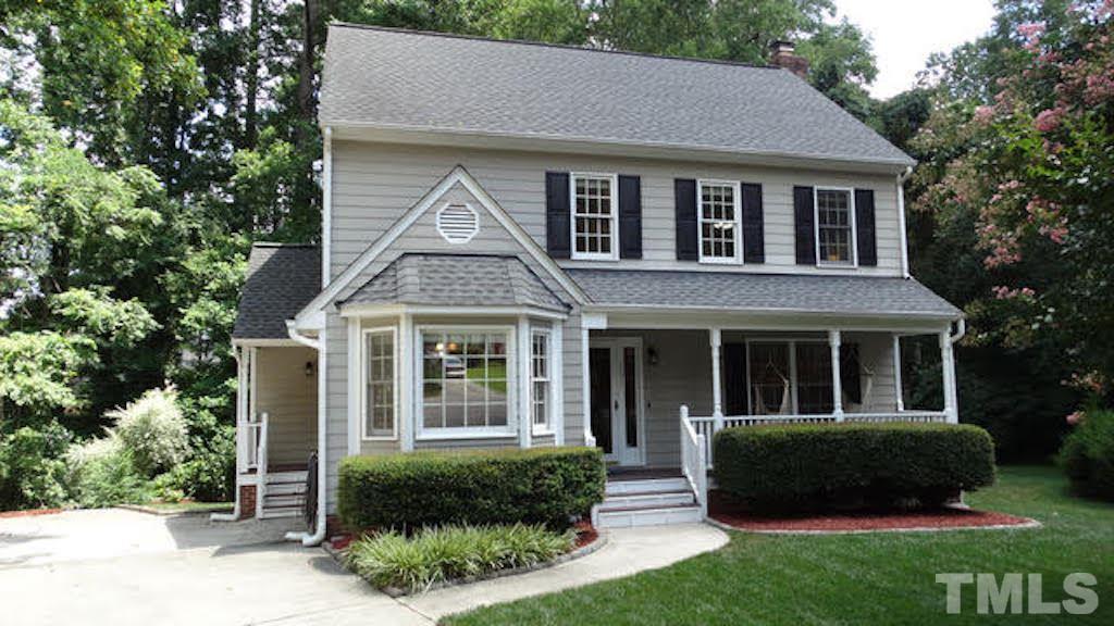6812 Chasewick Circle Raleigh, NC 27615 - Photo 1 of 30 a front view of a house with a yard