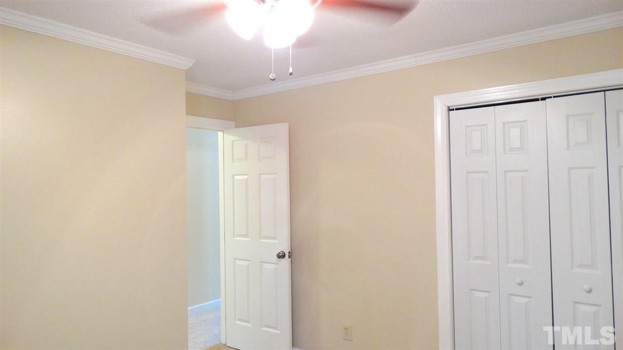 6812 Chasewick Circle Raleigh, NC 27615 - Photo 20 of 30 a view of a hallway with closet area