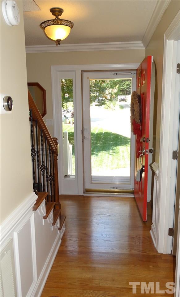 6812 Chasewick Circle Raleigh, NC 27615 - Photo 23 of 30 a view of an entryway with wooden floor