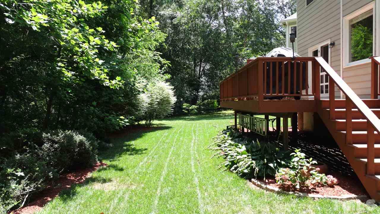 6812 Chasewick Circle Raleigh, NC 27615 - Photo 27 of 30 a view of a garden with an outdoor seating