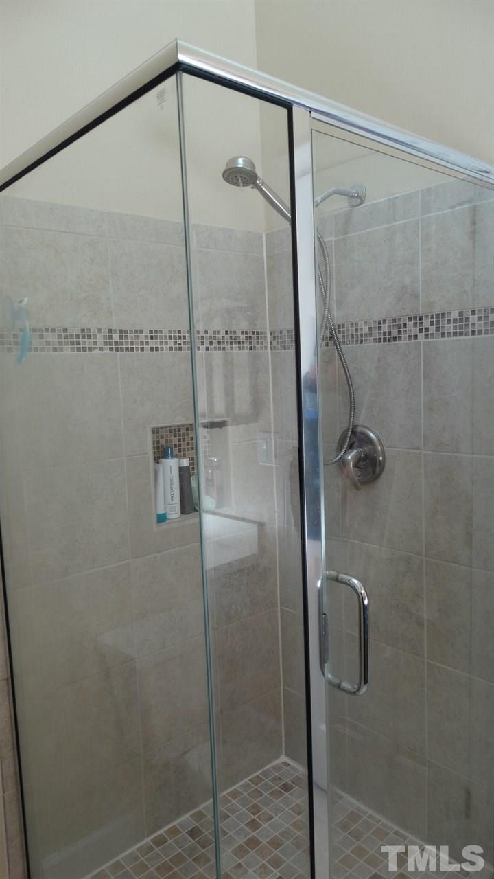 6812 Chasewick Circle Raleigh, NC 27615 - Photo 10 of 30 a bathroom with a shower