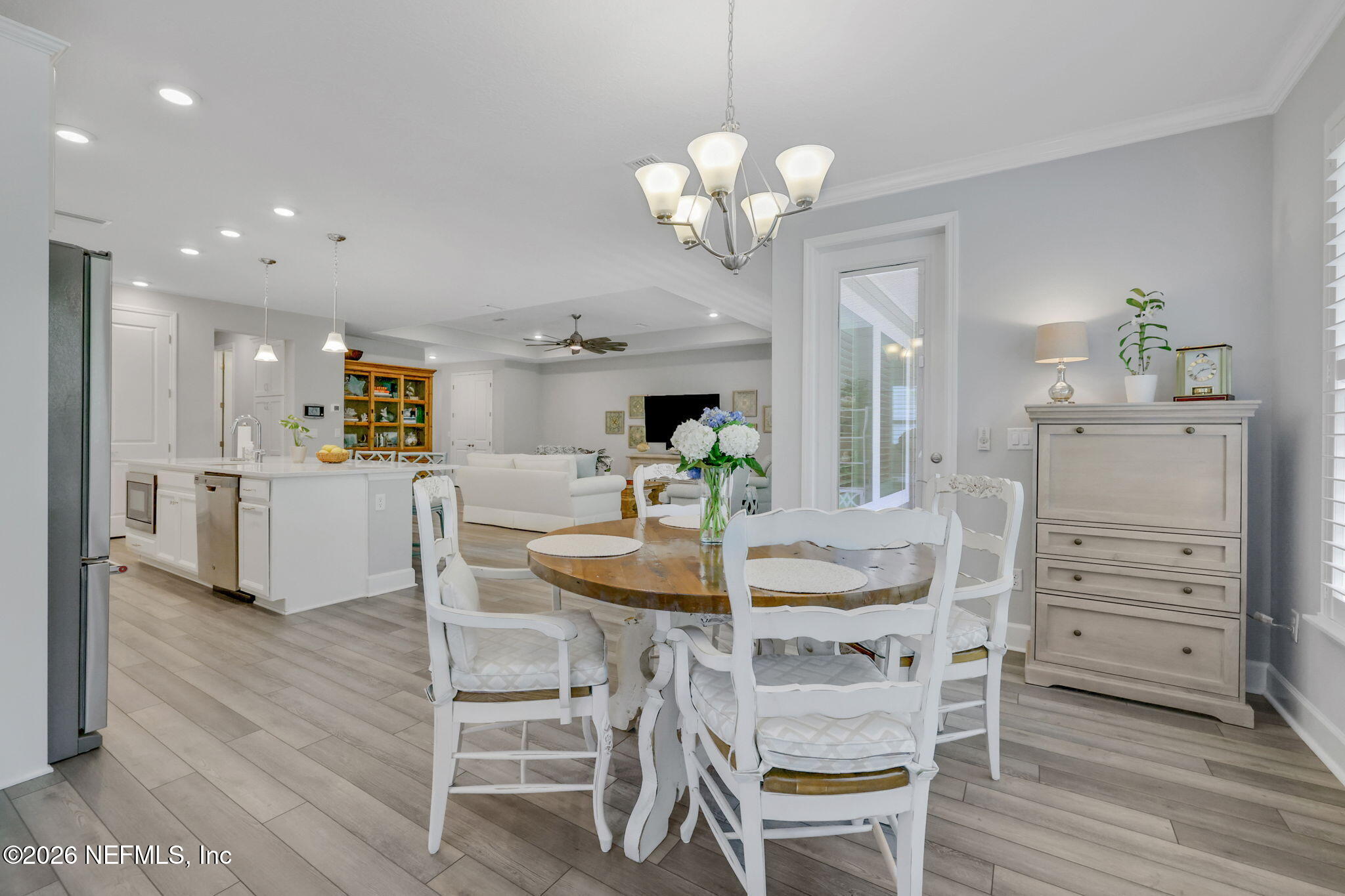 146 Clarendon Road St. Johns, FL 32259 - Photo 23 of 59 a view of a dining room with furniture and wooden floor