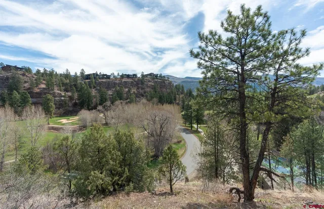 a view of lake with green space