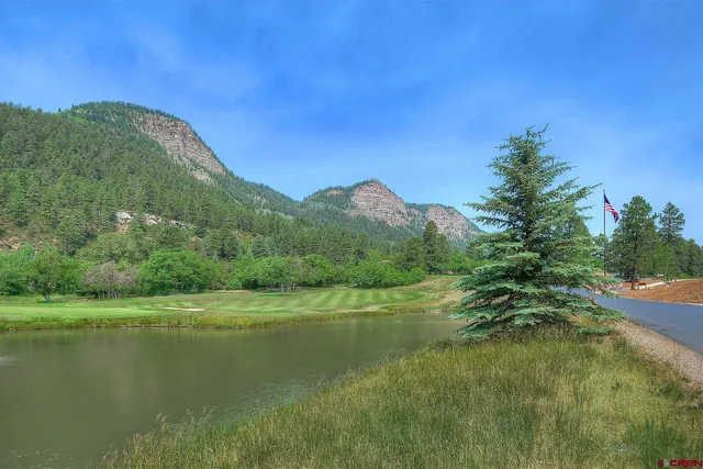 a view of a lake with a mountain in the background