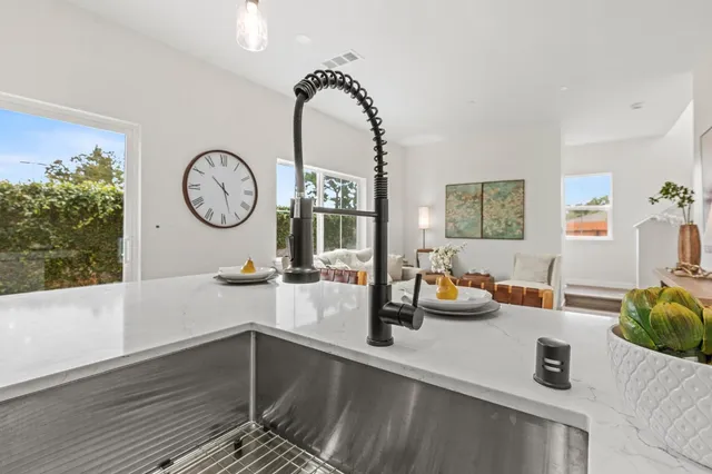 a bedroom with a bed and a table in it