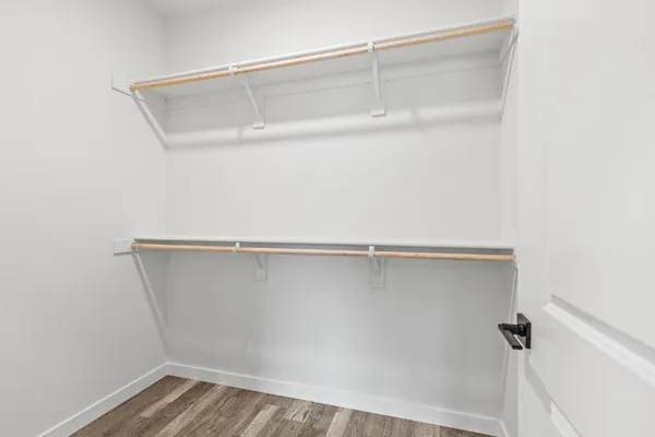 a kitchen with a window a sink and a refrigerator