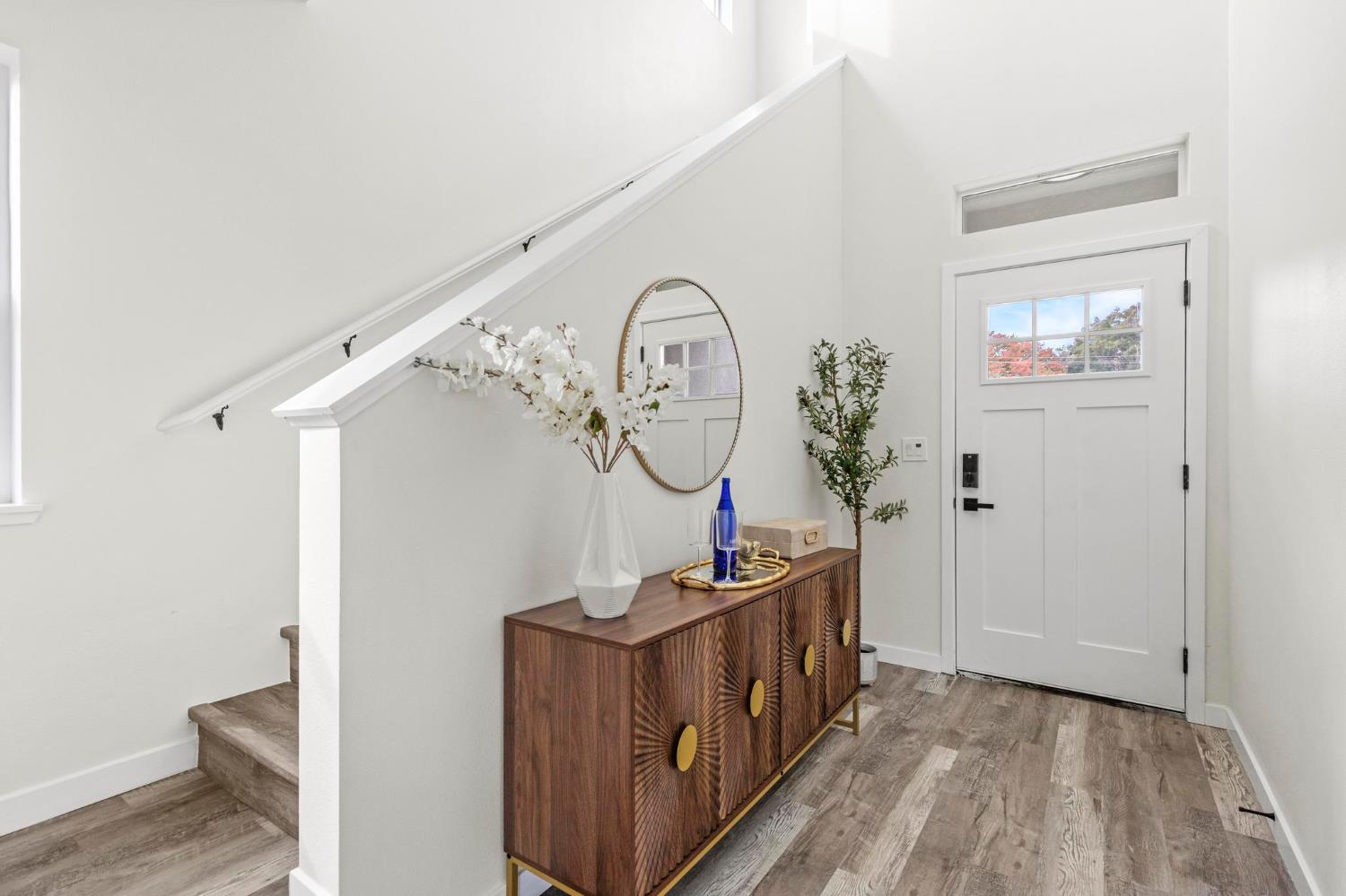 179 Park Circle Gridley, CA 95948 - Photo 6 of 57 a view of a hallway with wooden floor and entryway