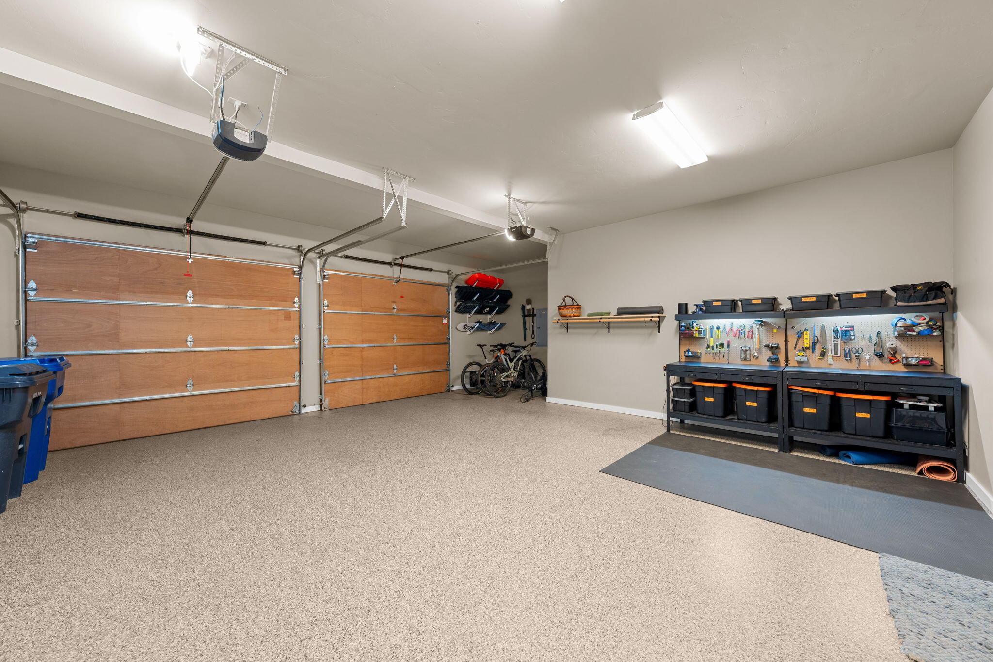 61329 Triple Knot Road Bend, OR 97702 - Photo 39 of 43 Garage has epoxy floor and storage bump out for gear