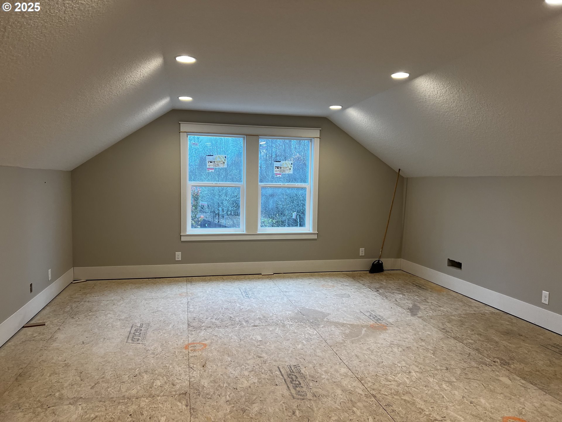 16221 Northeast 180th Street Brush Prairie, WA 98606 - Photo 13 of 43 a view of an empty room with a window