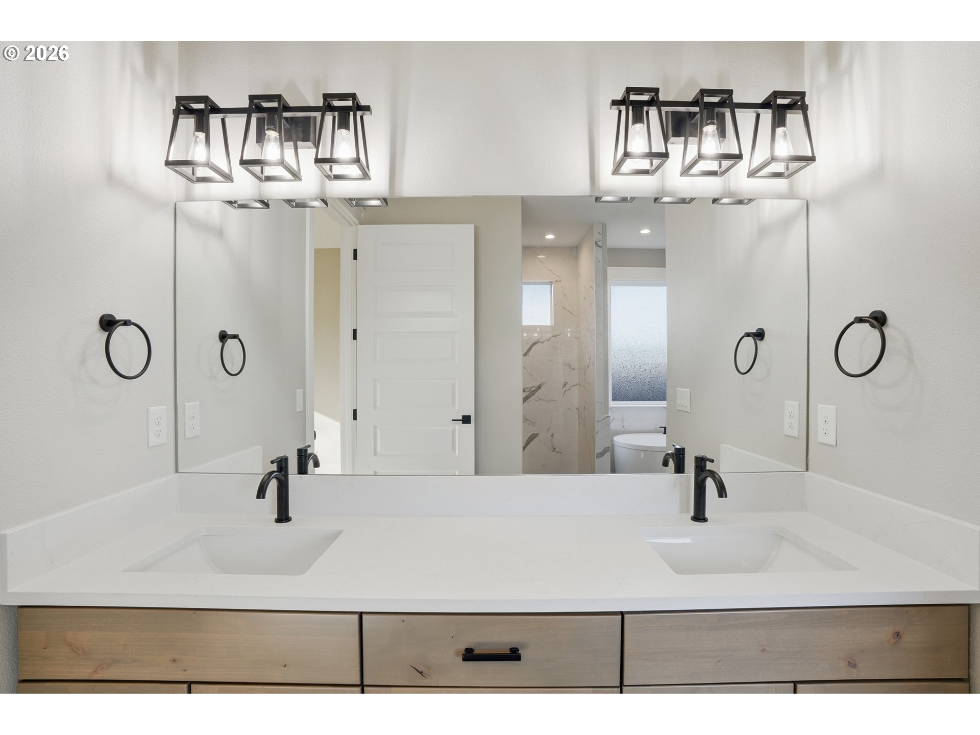 16221 Northeast 180th Street Brush Prairie, WA 98606 - Photo 28 of 43 a bathroom with a sink vanity and a mirror