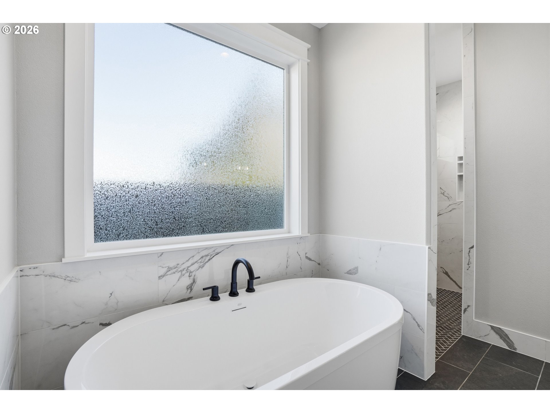 16221 Northeast 180th Street Brush Prairie, WA 98606 - Photo 30 of 43 a bathroom with a bathtub and a sink
