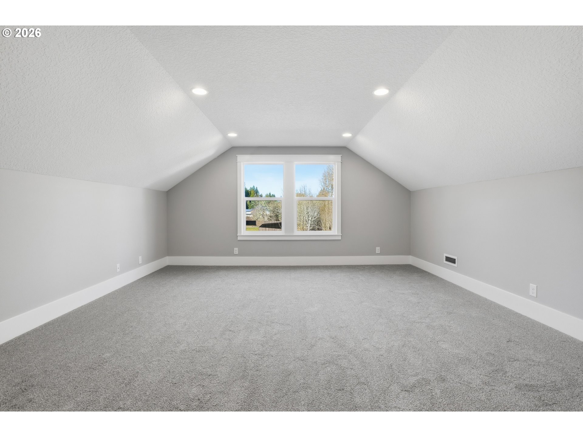 16221 Northeast 180th Street Brush Prairie, WA 98606 - Photo 33 of 43 a view of a big room with wooden floor and windows