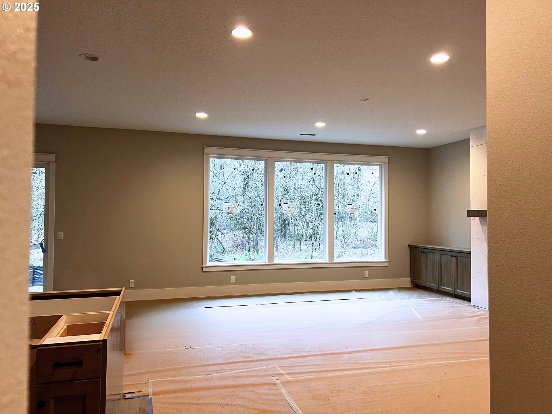 16221 Northeast 180th Street Brush Prairie, WA 98606 - Photo 10 of 43 a view of an empty room with a window