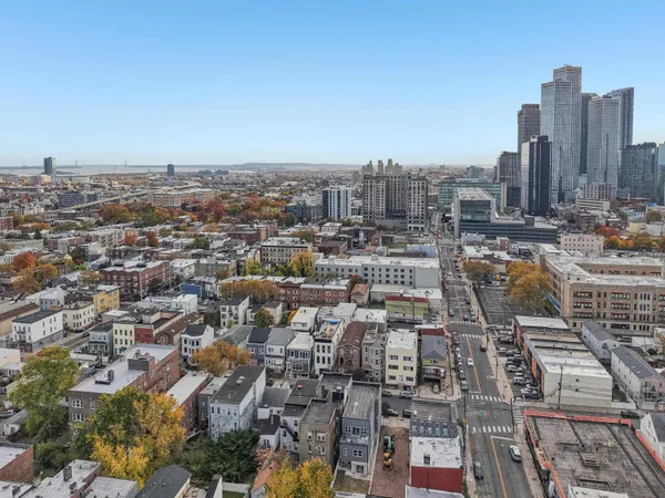 a view of a city with tall buildings