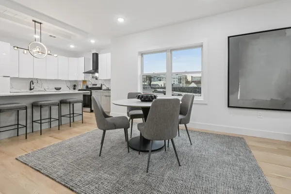 a view of a dining room with furniture