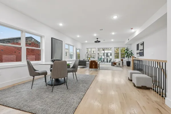 a living room with furniture and a table