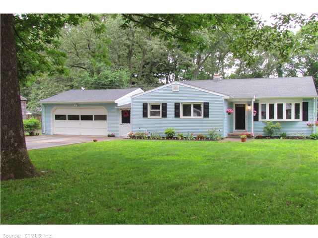 10 Dover Road North Haven, CT 06473 - Photo 1 of 1 a front view of a house with a garden