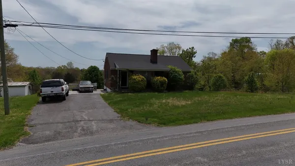 a view of a car parked on the side of the road