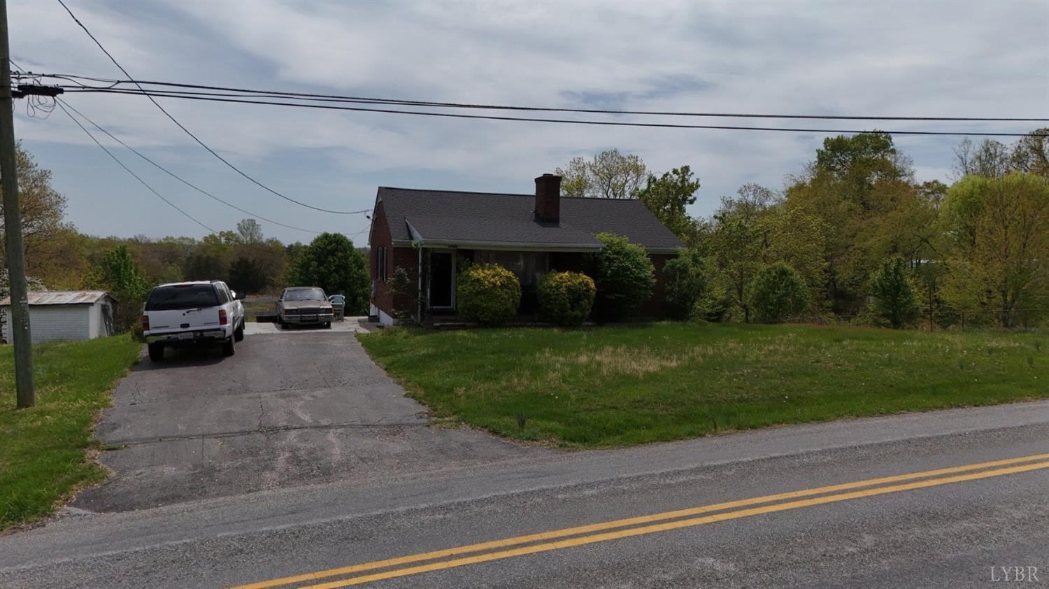a view of a car parked on the side of the road