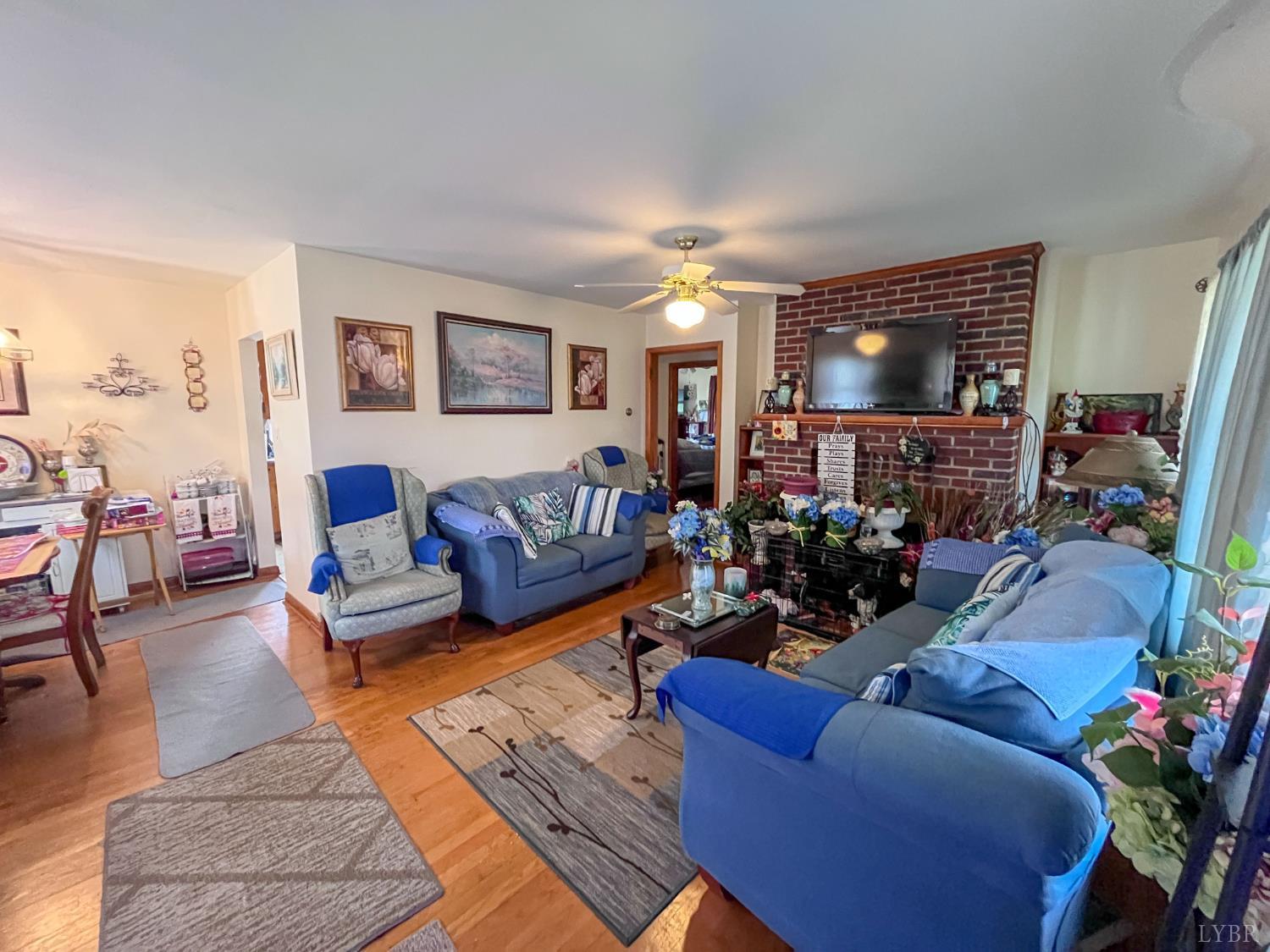 2663 Dearing Ford Road Altavista, VA 24517 - Photo 12 of 21 a living room with furniture and a flat screen tv