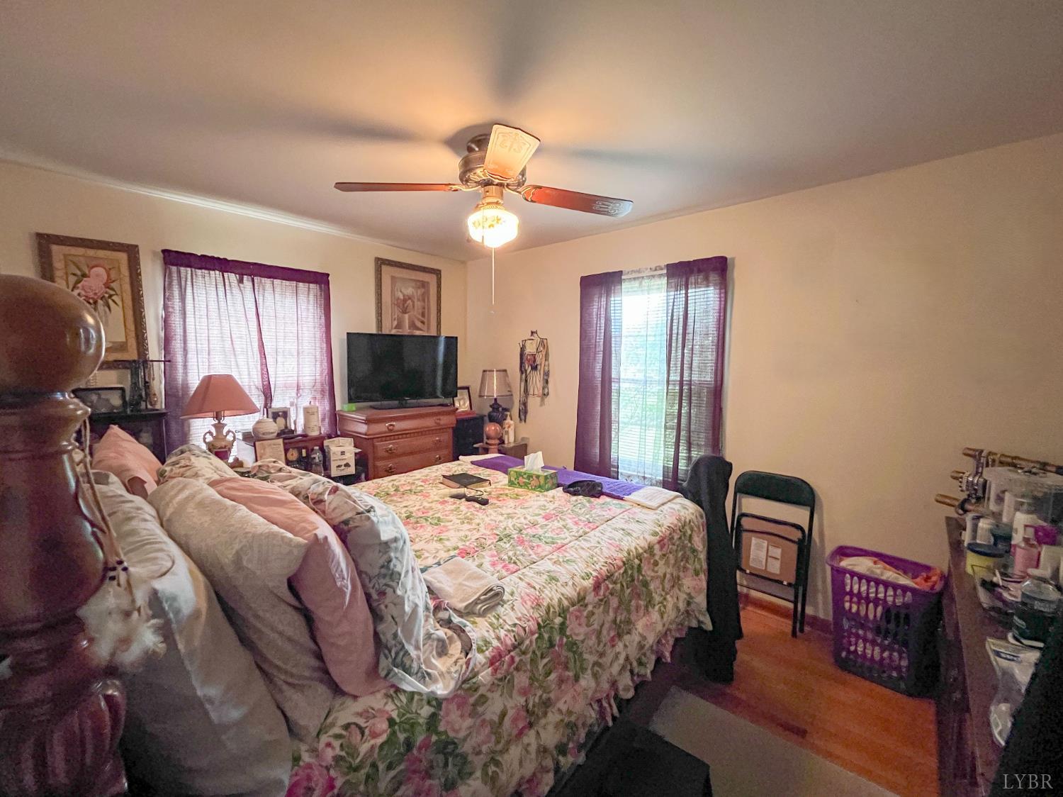 2663 Dearing Ford Road Altavista, VA 24517 - Photo 16 of 21 a bedroom with bed tv and a window