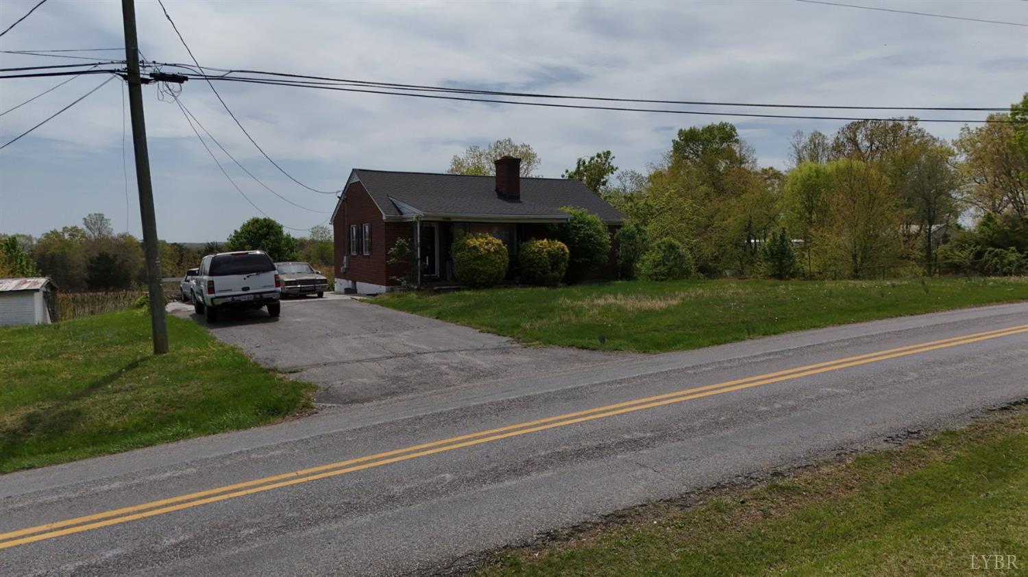 2663 Dearing Ford Road Altavista, VA 24517 - Photo 3 of 6 a view of a street that has a street sign on the side of it