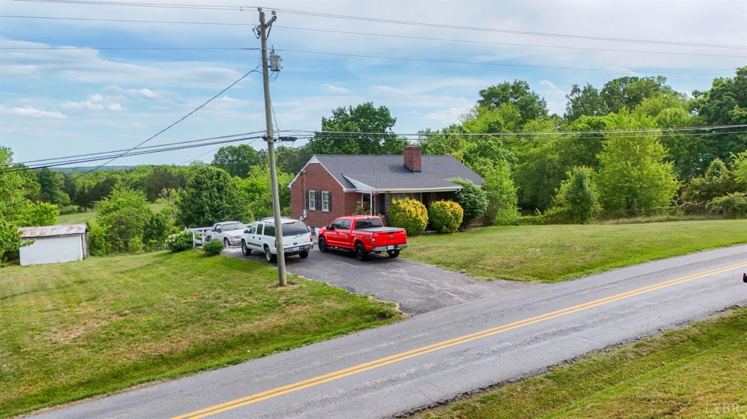 2663 Dearing Ford Road Altavista, VA 24517 - Photo 6 of 21 a view of yard with car parked