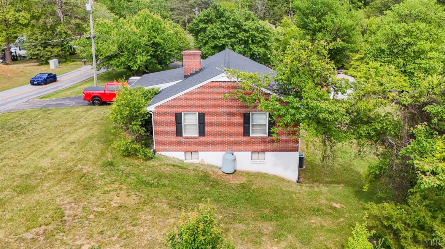 2663 Dearing Ford Road Altavista, VA 24517 - Photo 9 of 21 a front view of a house with swimming pool
