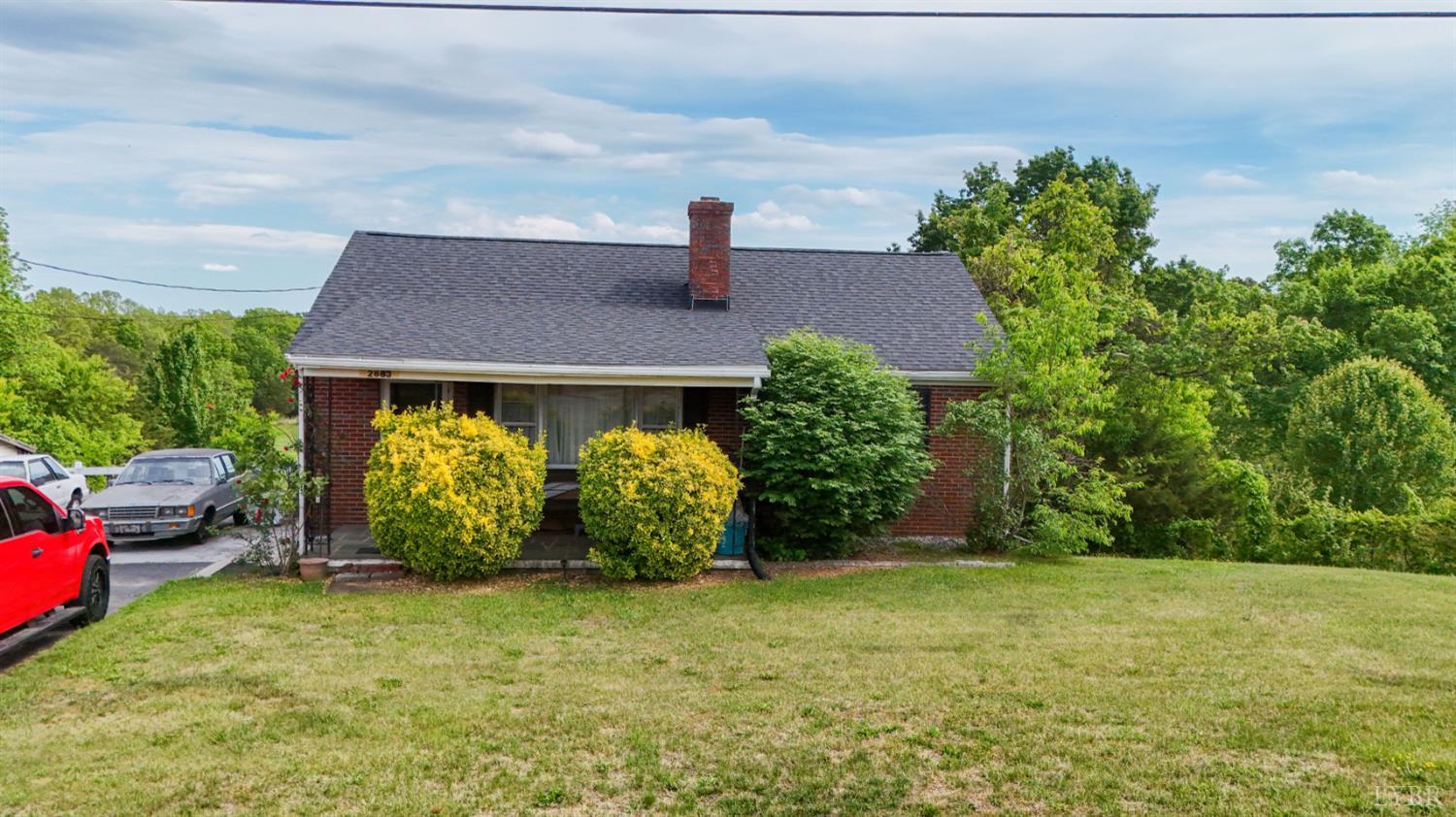 2663 Dearing Ford Road Altavista, VA 24517 - Photo 10 of 21 a front view of a house with garden
