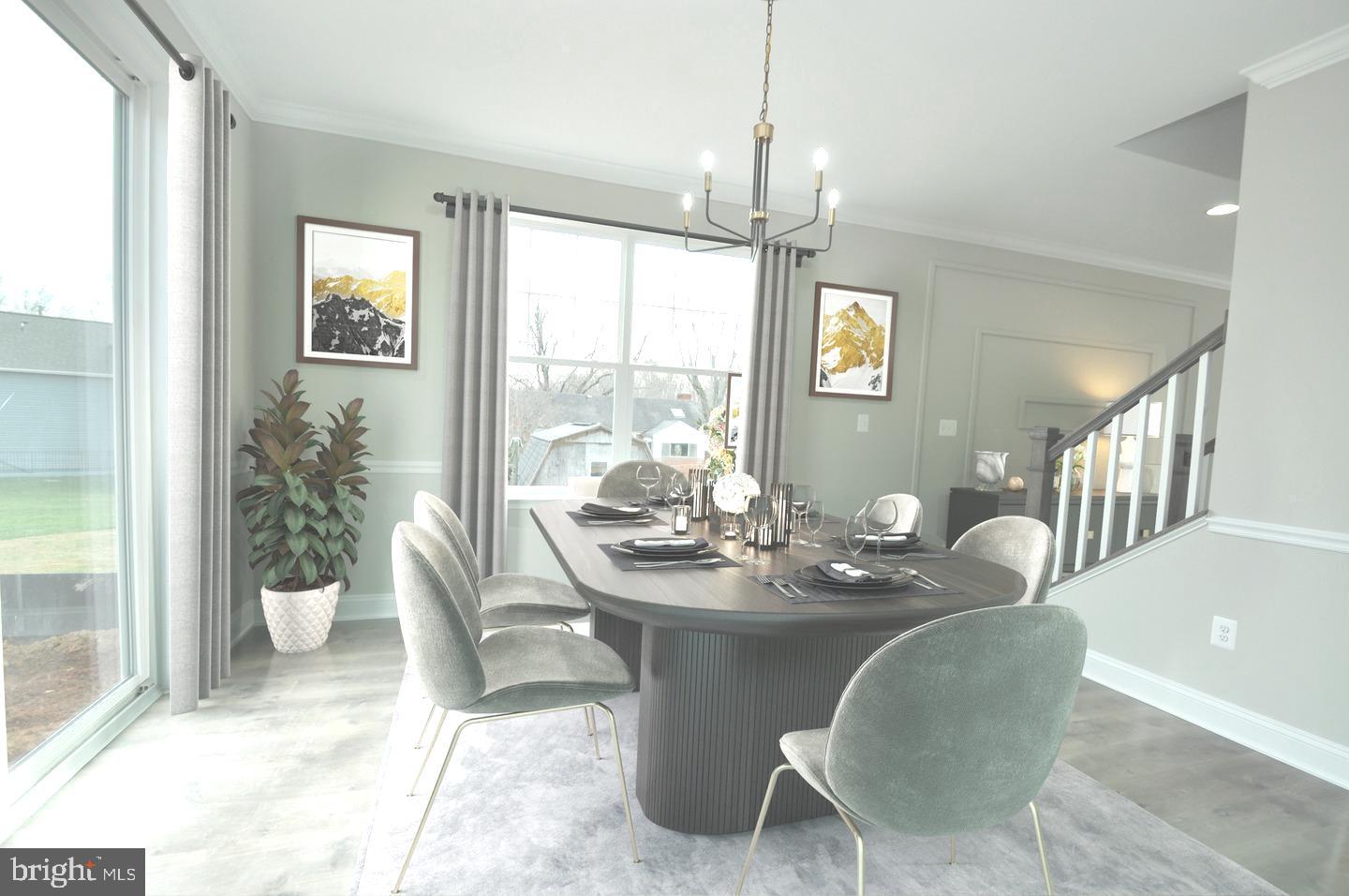 9138 Eton Road Silver Spring, MD 20901 - Photo 5 of 24 a dining room with furniture a chandelier and wooden floor