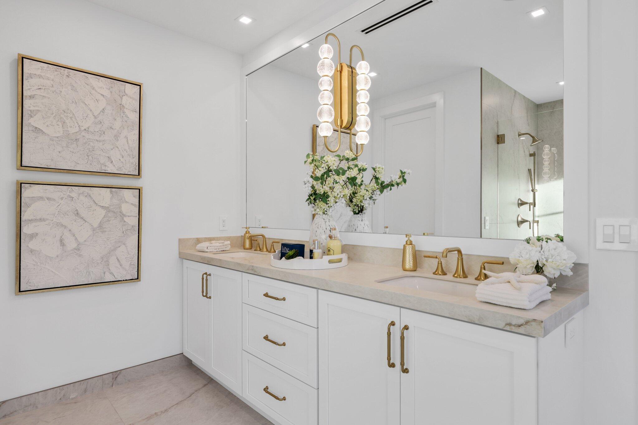 209 Northeast 5th Street Delray Beach, FL 33444 - Photo 25 of 47 a bathroom with a double vanity sink and a mirror