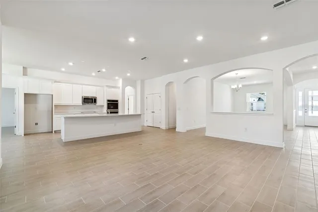 a view of a kitchen with a sink
