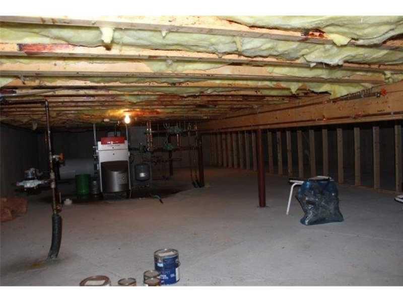 5 Landing Road Saco, ME 04072 - Photo 18 of 21 Basement. large partial basement to...