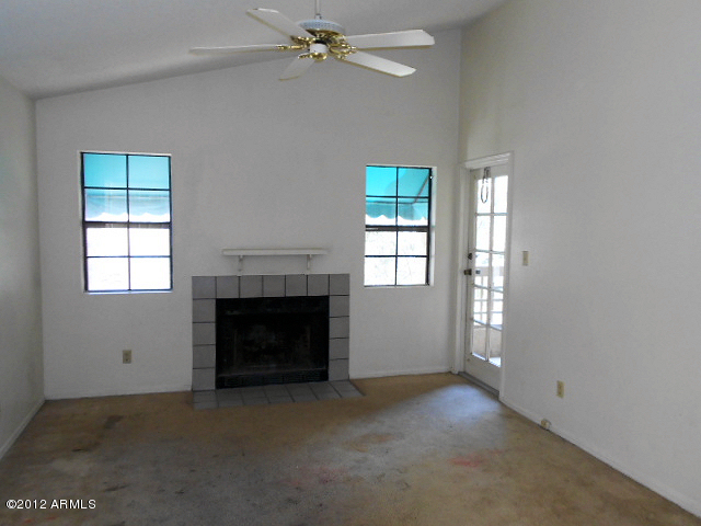 2855 South Ext Road, Unit 241 Mesa, AZ 85210 - Photo 17 of 20 living room and door to balcony
