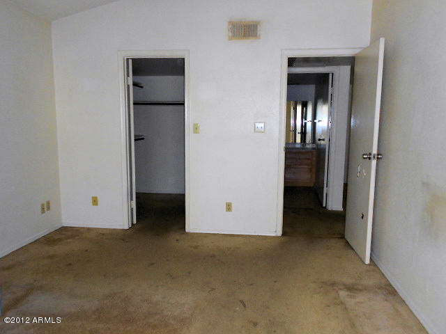 2855 South Ext Road, Unit 241 Mesa, AZ 85210 - Photo 6 of 20 bedroom and hallway to bathroom