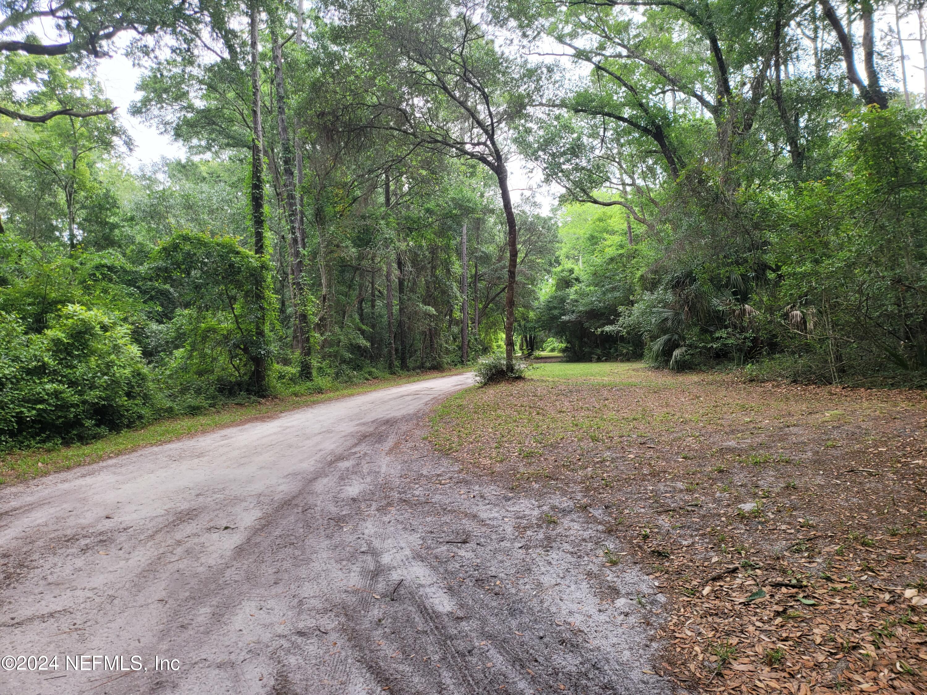 0 Flagler Boulevard St. Augustine, FL 32095 - Photo 4 of 13 a view of outdoor space with trees all around