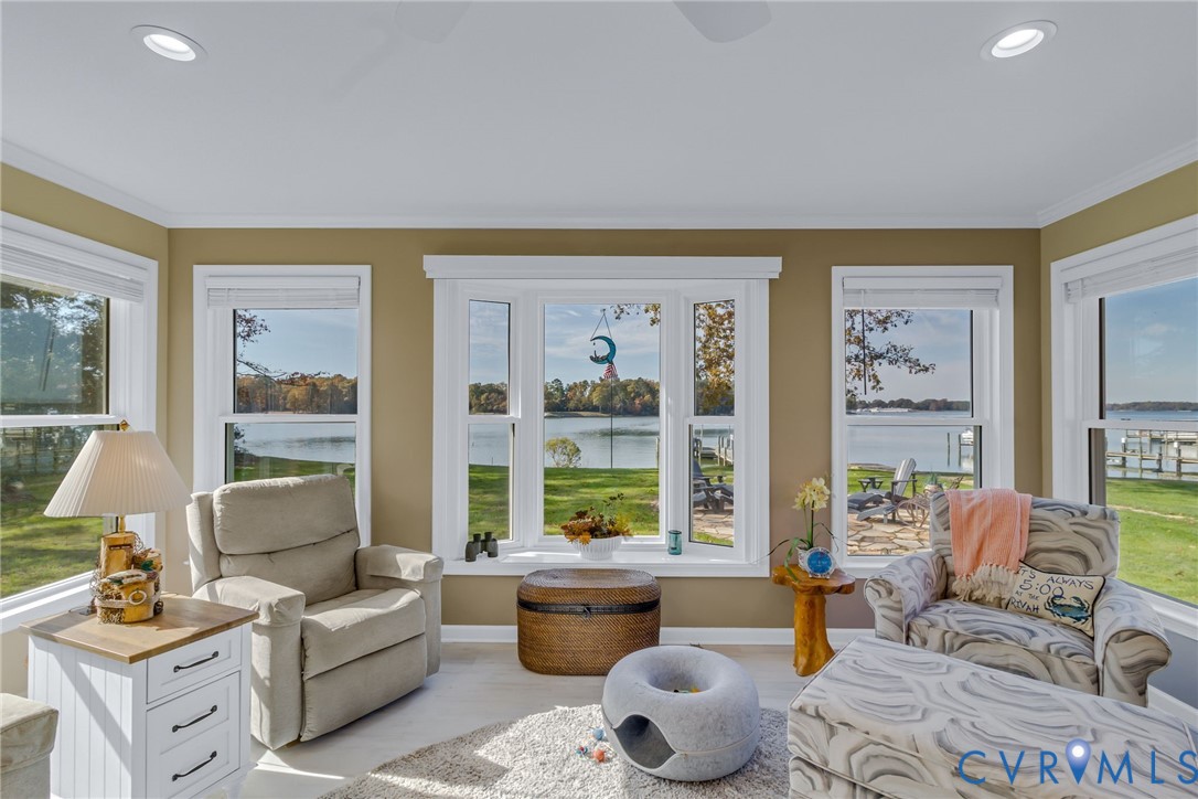 358 Barn Point Road Lottsburg, VA 22511 - Photo 13 of 48 a living room with furniture and a large window