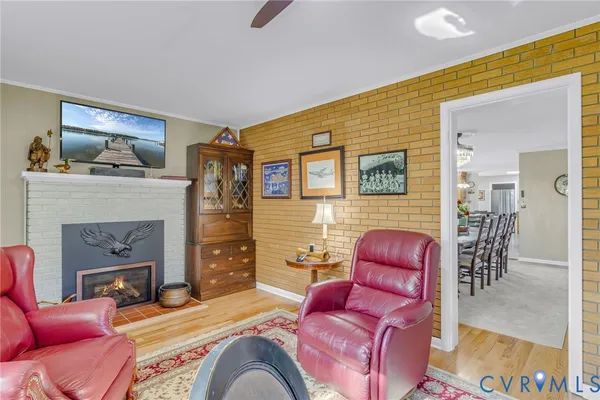 a living room with furniture or couch and a fireplace