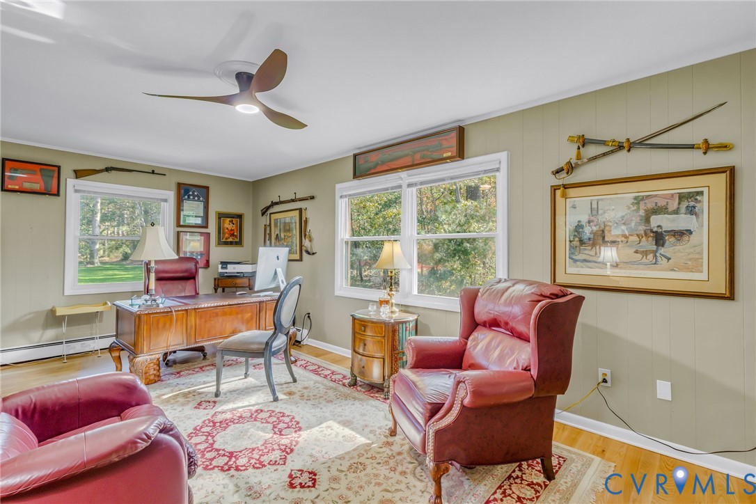 358 Barn Point Road Lottsburg, VA 22511 - Photo 16 of 48 a living room with furniture and a window
