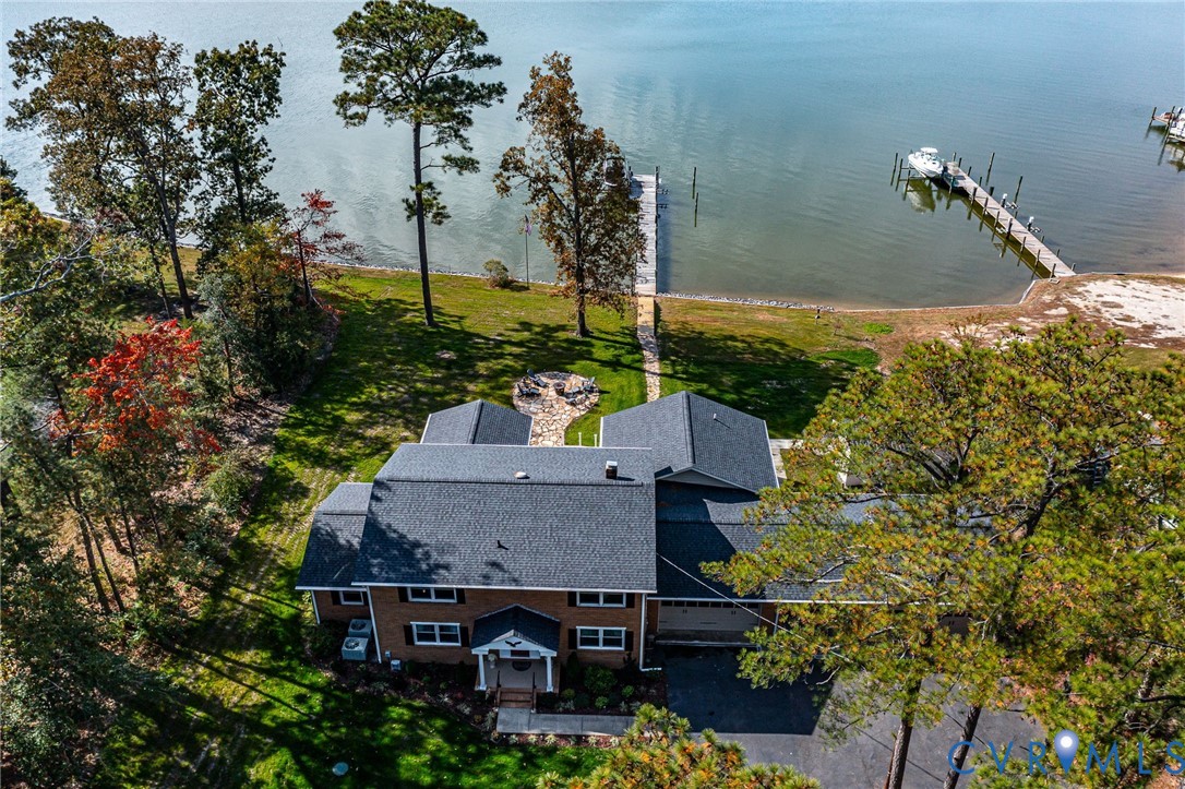 358 Barn Point Road Lottsburg, VA 22511 - Photo 34 of 48 an aerial view of a house with a yard
