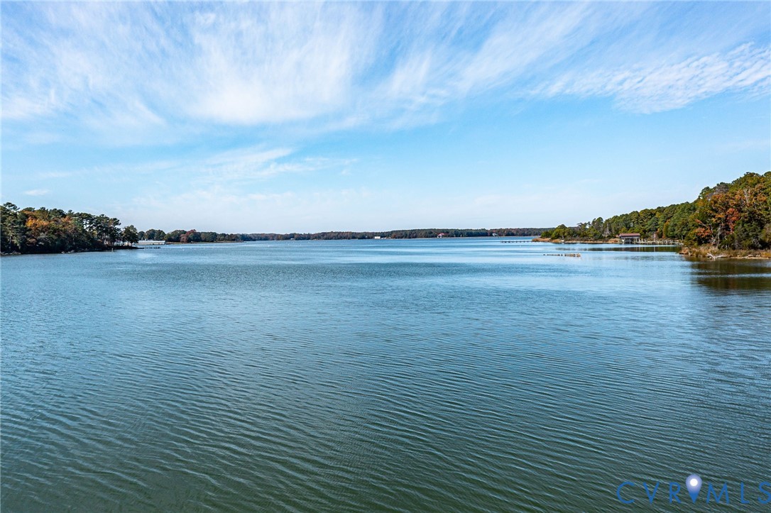 358 Barn Point Road Lottsburg, VA 22511 - Photo 38 of 48 a view of an ocean with beach
