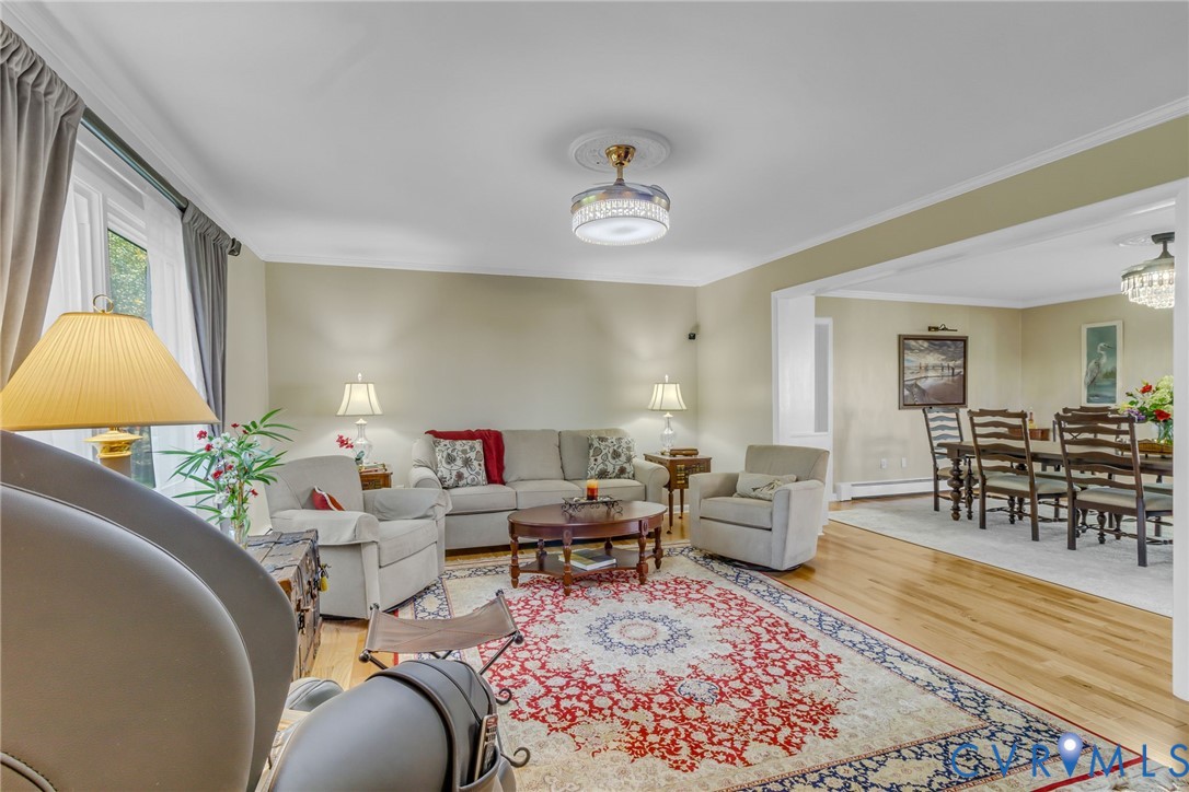 358 Barn Point Road Lottsburg, VA 22511 - Photo 5 of 48 a living room with furniture and a table