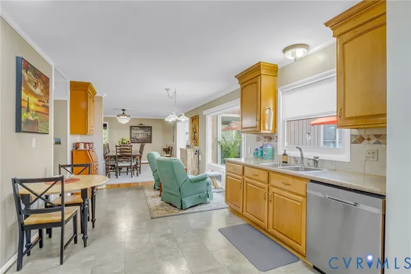 a kitchen with a sink and cabinets