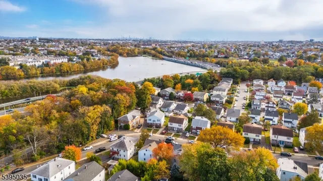 an aerial view of city and lake
