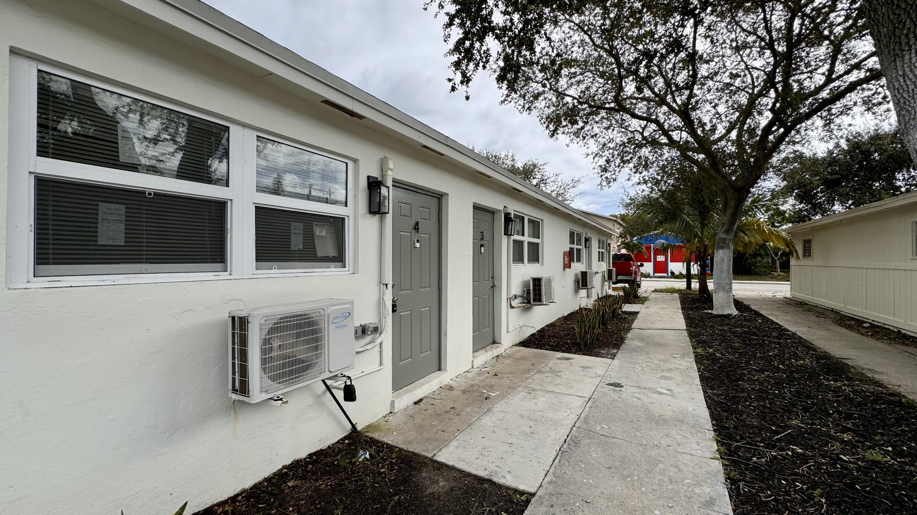 225 South F Street, Unit 6 Lake Worth Beach, FL 33460 - Photo 6 of 11 a view of a entryway in front of house