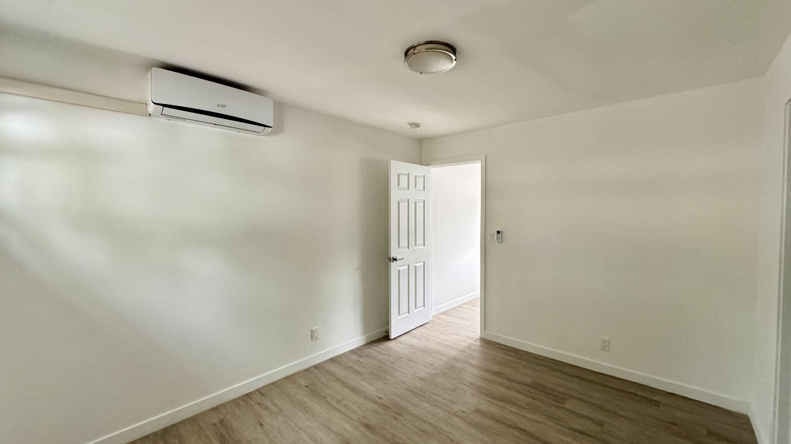 225 South F Street, Unit 6 Lake Worth Beach, FL 33460 - Photo 8 of 11 a view of an empty room