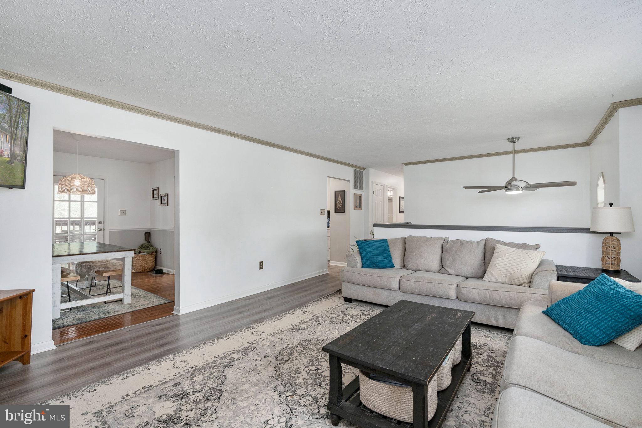 15195 Dyers Road Woodbridge, VA 22193 - Photo 11 of 53 a living room with furniture and wooden floor